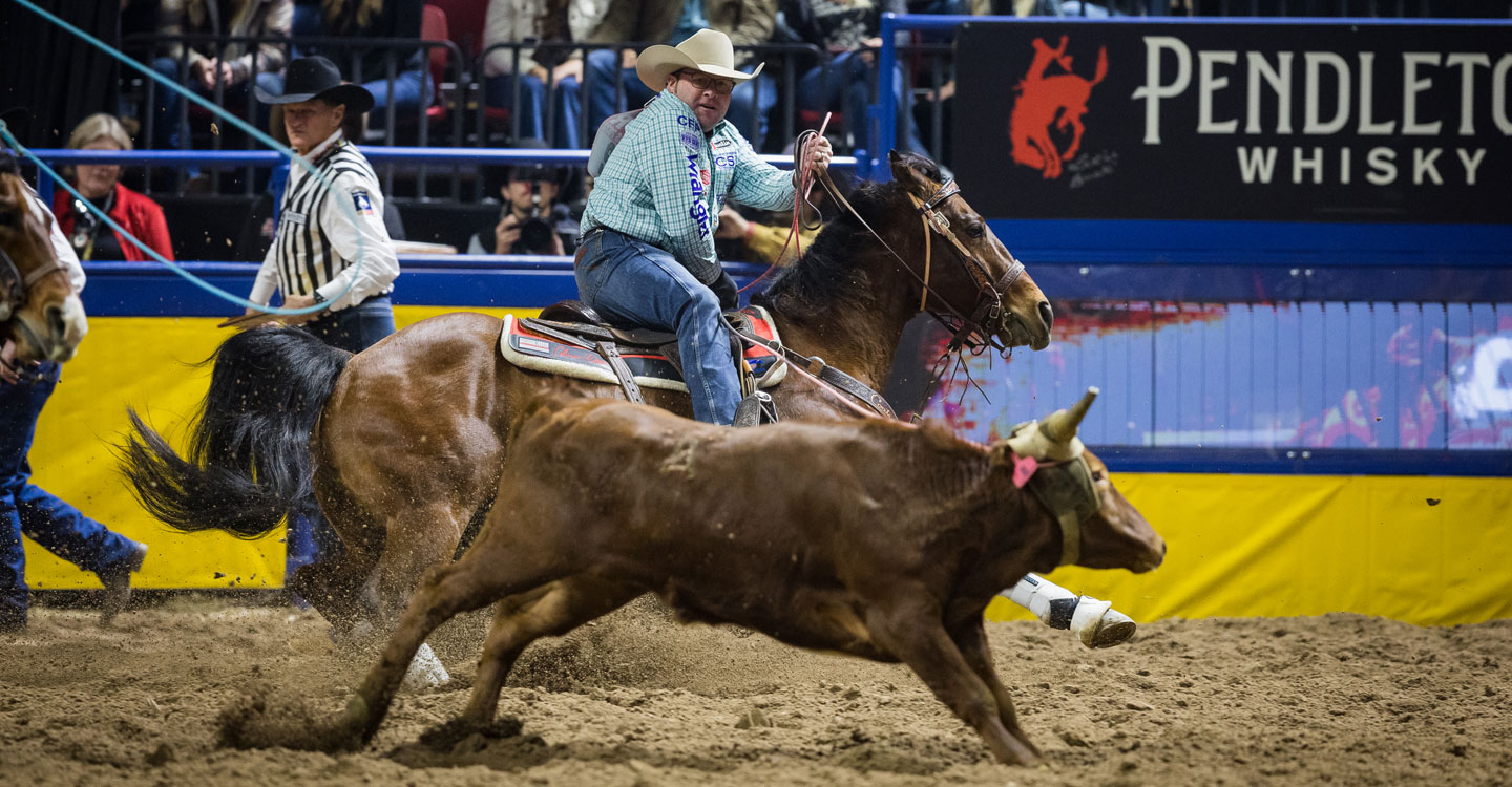 Coleman Proctor at the National Finals Rodeo (NFR), competing in the team roping event.